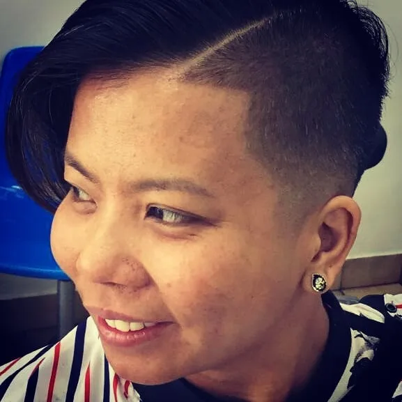 Woman with side-shaved undercut — all ages, all styles welcome